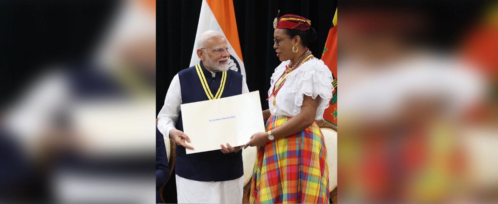 H.E. Sylvanie Burton, President of the Commonwalth Dominica conferred on Prime Minister Shri Narendra Modi the